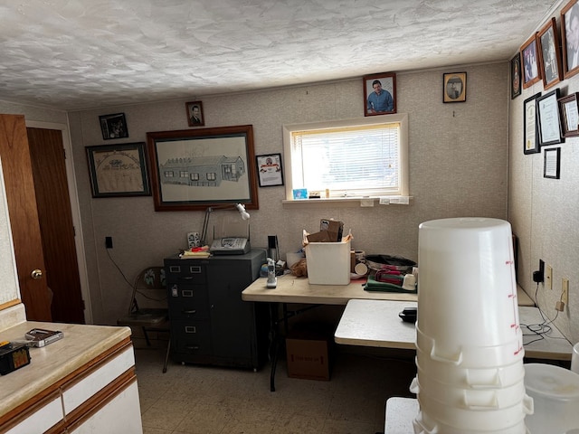 office area featuring a textured ceiling