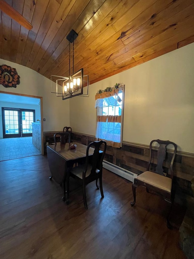 dining space with wooden ceiling, dark wood-type flooring, a healthy amount of sunlight, and a notable chandelier