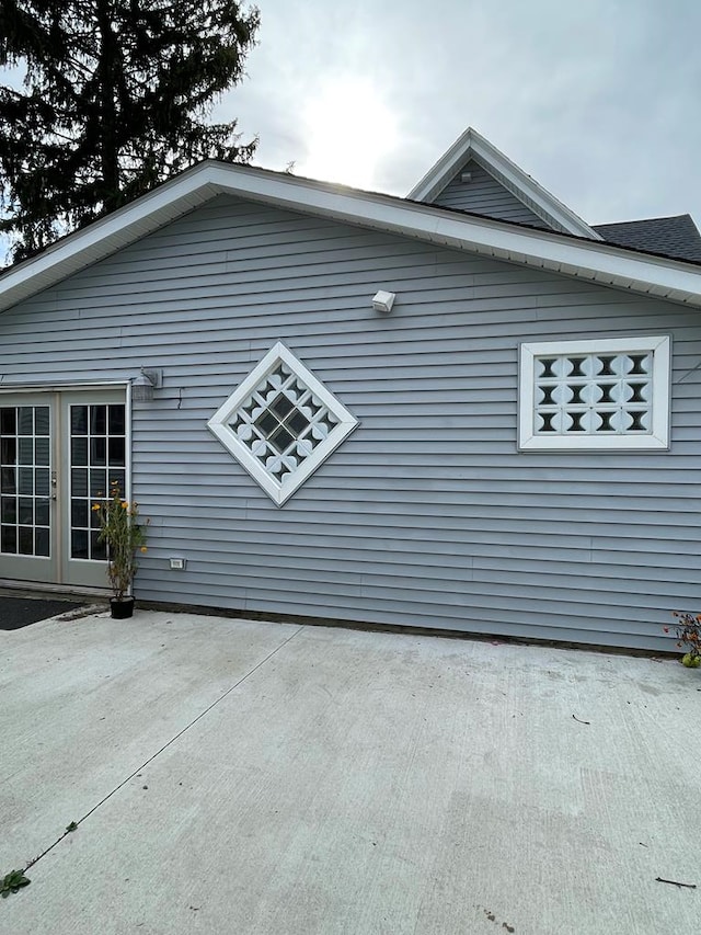 view of home's exterior with french doors