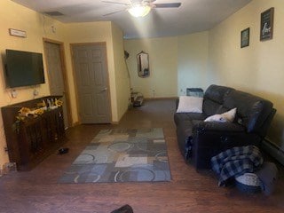 living room featuring ceiling fan