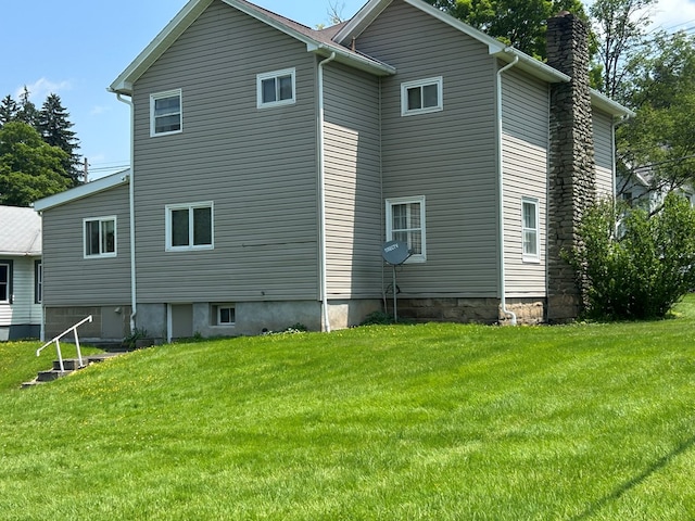 408 S E St, Coudersport, PA 16915 - rear view of property with a yard and a chimney