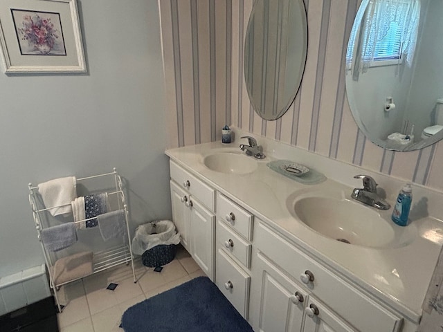 408 S E St, Coudersport, PA 16915 - bathroom with double vanity, tile patterned floors, and wallpapered walls