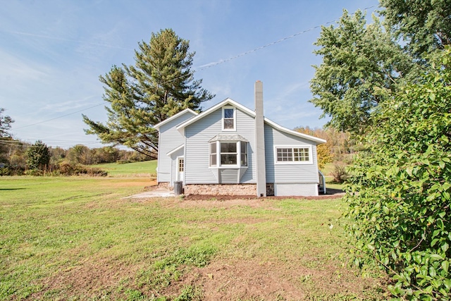 exterior space featuring a front lawn