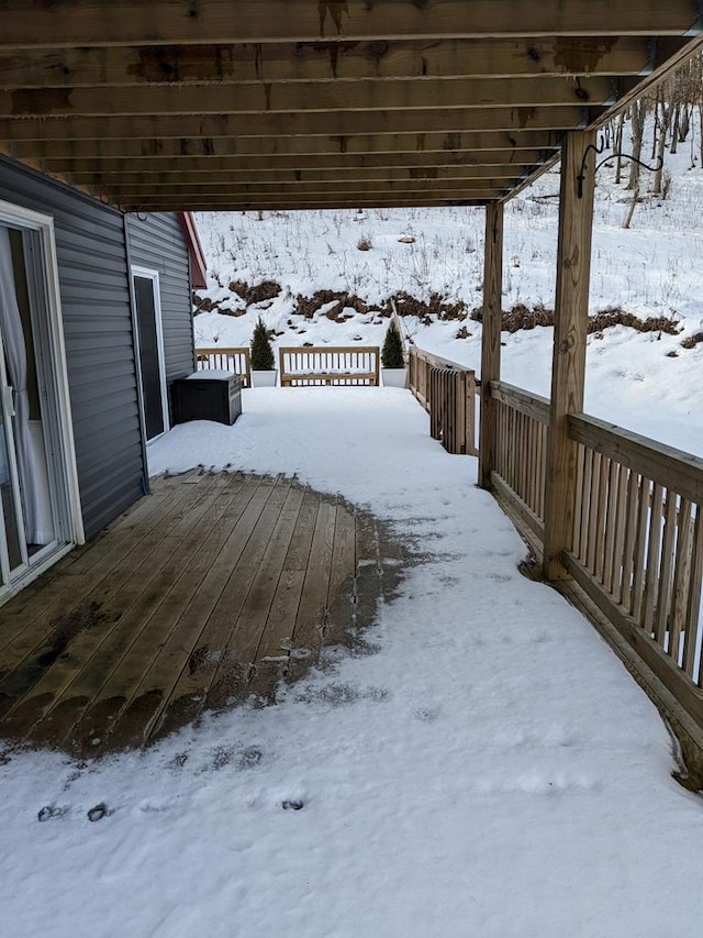 view of snow covered deck