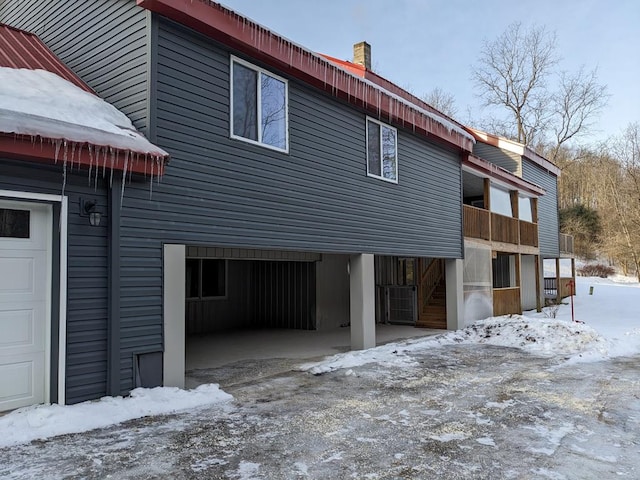 view of snow covered property