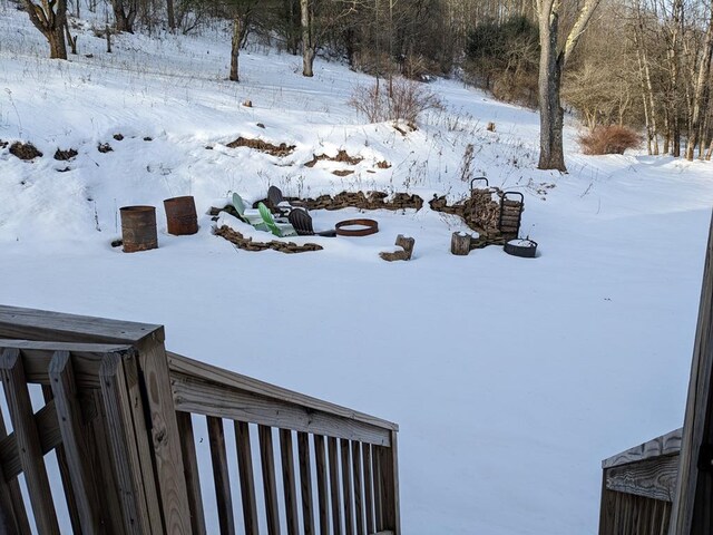 view of yard layered in snow