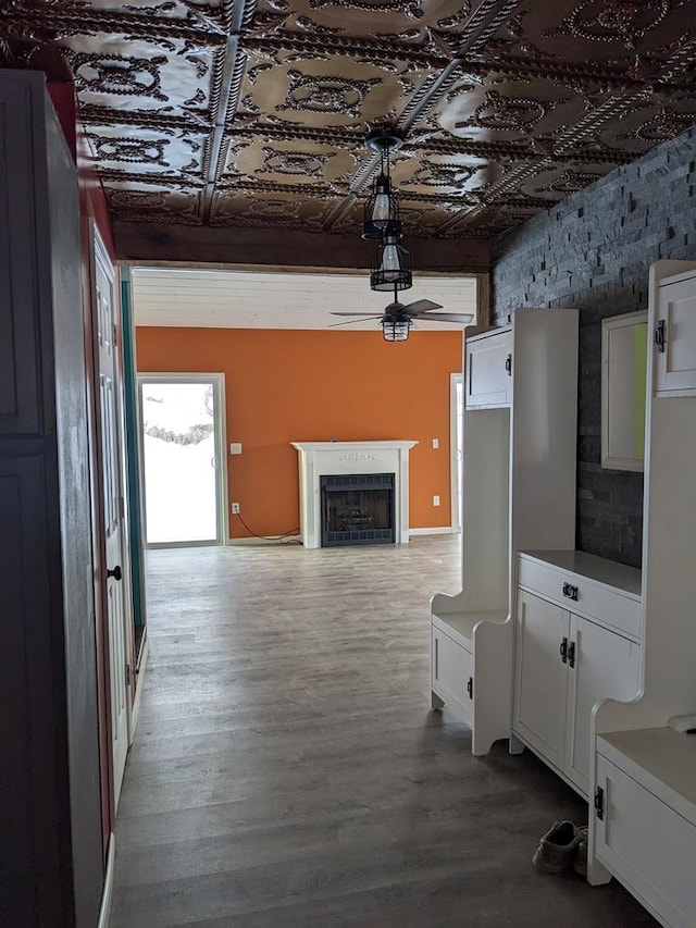 kitchen featuring white cabinetry and hardwood / wood-style floors