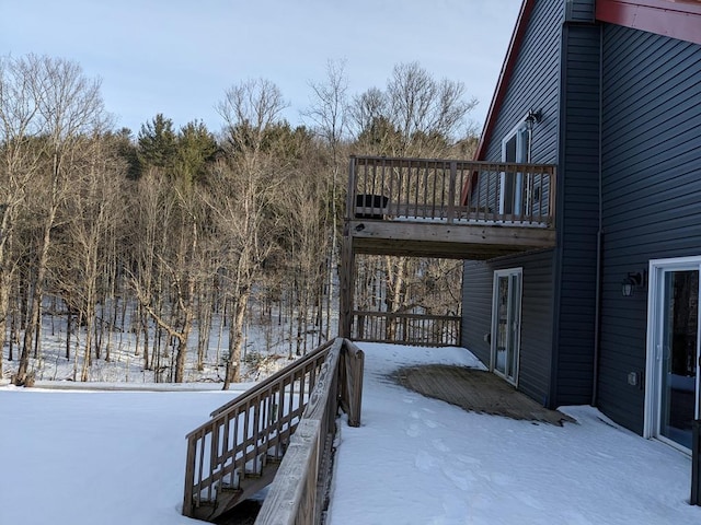 view of snow covered deck