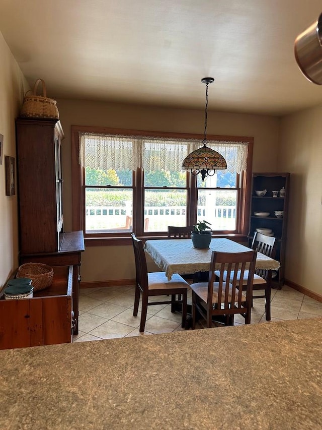 dining room featuring light tile patterned floors