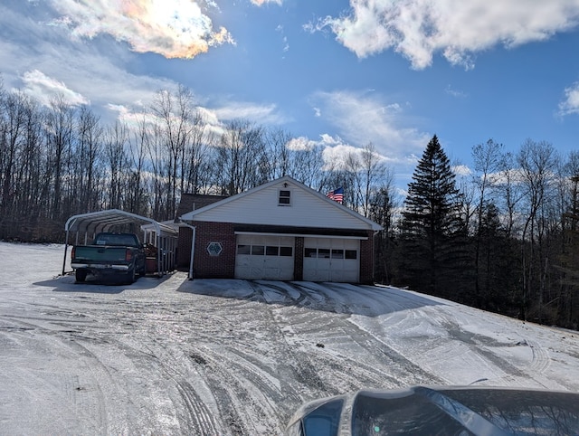 garage featuring a carport