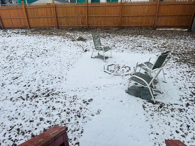 view of yard covered in snow