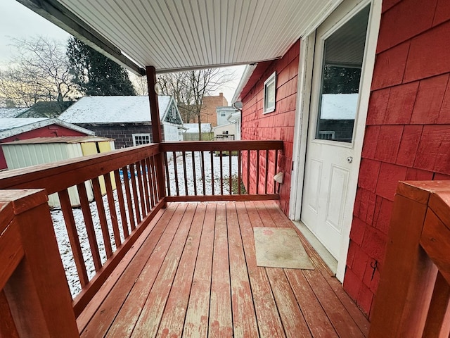 view of snow covered deck