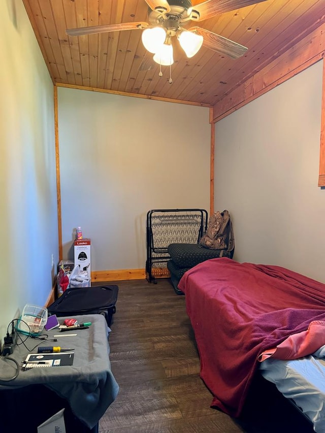 bedroom featuring ceiling fan, wood ceiling, dark wood-type flooring, and ornamental molding