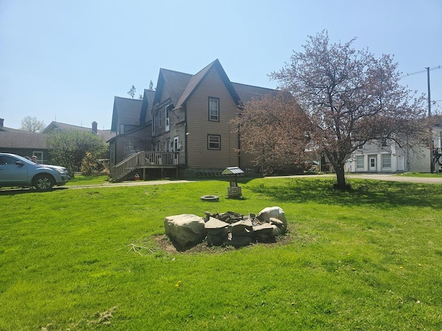 exterior space featuring a fire pit
