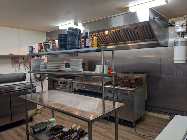 kitchen with hardwood / wood-style floors