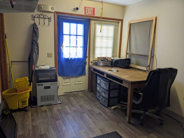 home office with dark wood-type flooring