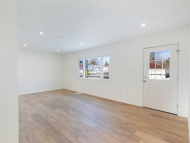 entryway with light hardwood / wood-style flooring