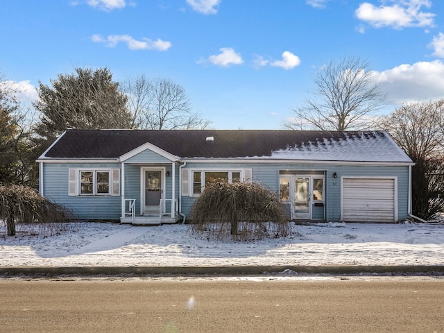 view of front of property featuring a garage