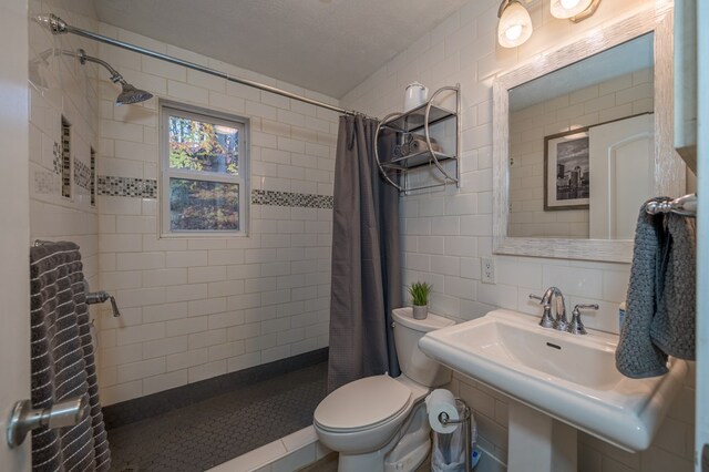 bathroom featuring decorative backsplash, toilet, walk in shower, and tile walls