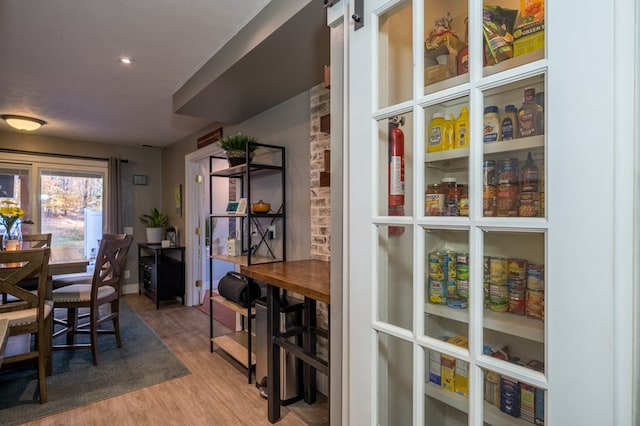 dining space featuring wood-type flooring