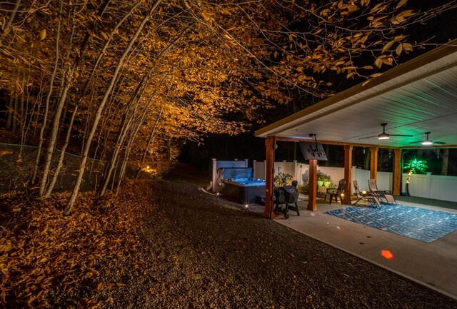 view of yard featuring a patio and ceiling fan