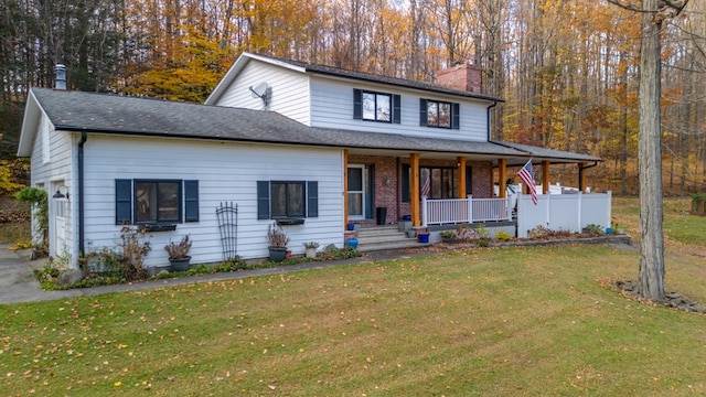 view of front of house featuring a front lawn and a porch