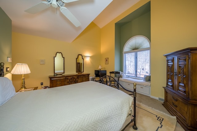 bedroom featuring ceiling fan, carpet floors, and high vaulted ceiling