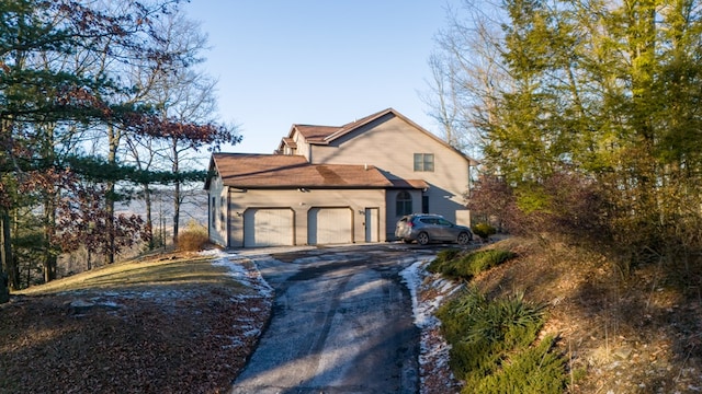 view of home's exterior featuring a garage