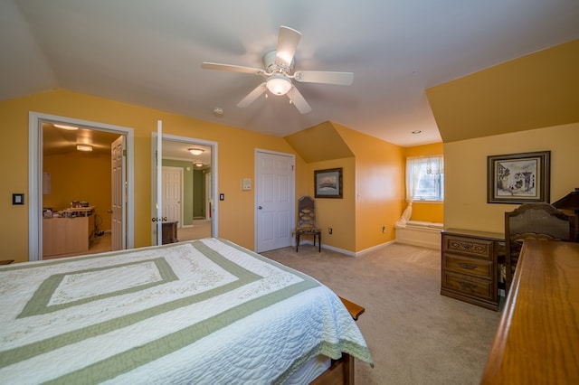 bedroom featuring light carpet, vaulted ceiling, and ceiling fan