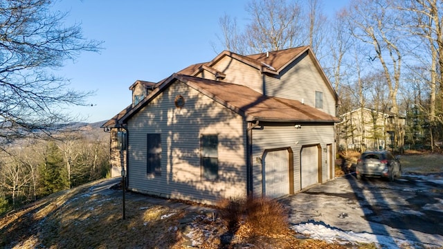 view of home's exterior featuring a garage