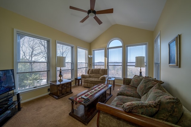 carpeted living room featuring ceiling fan and lofted ceiling