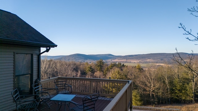 balcony with a deck with mountain view