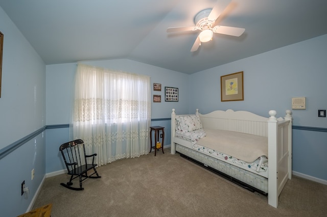 bedroom featuring ceiling fan, lofted ceiling, and carpet floors