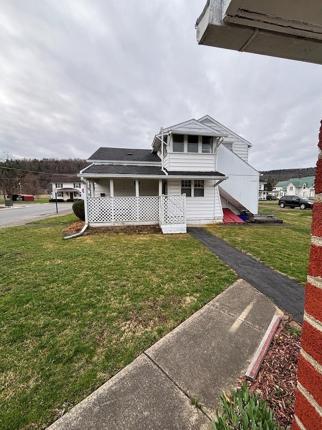 205 E Main St, Elkland, PA 16920 - view of front of property with a porch and a front yard