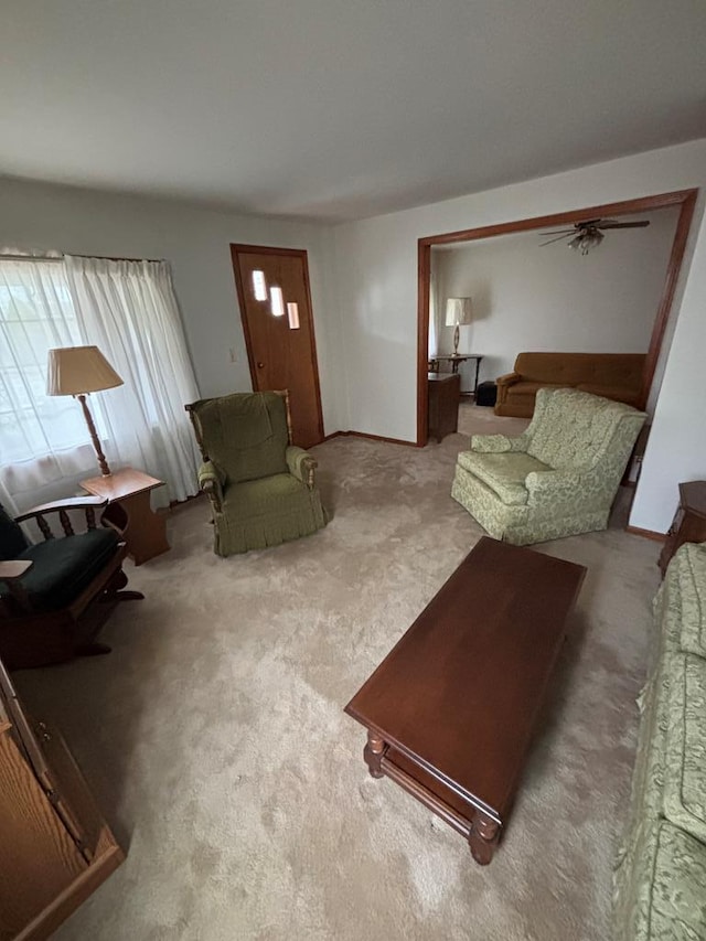 205 E Main St, Elkland, PA 16920 - carpeted living area featuring a ceiling fan and baseboards