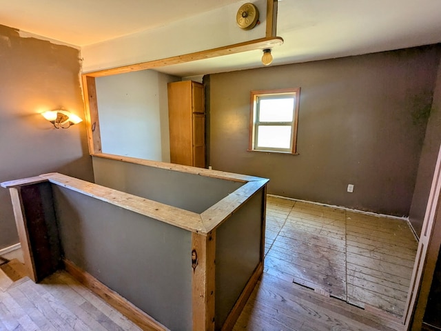 hall featuring light wood-style floors