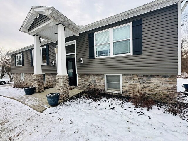 view of snow covered property