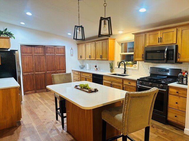 dining area with hardwood / wood-style flooring and ceiling fan