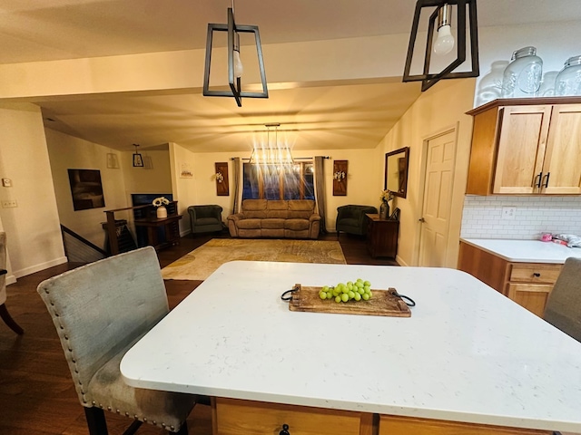 dining space with lofted ceiling