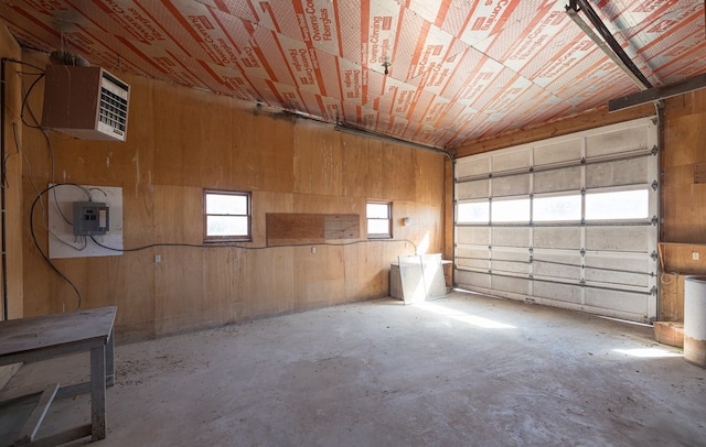 56 Benson Ave, Mansfield, PA 16933 - garage featuring wooden walls and electric panel