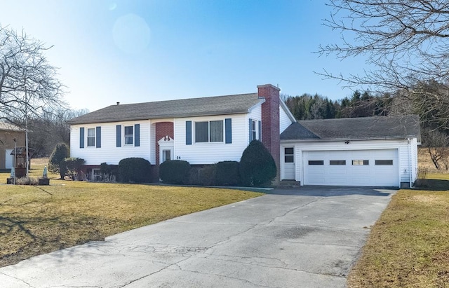 56 Benson Ave, Mansfield, PA 16933 - view of front of house with roof with shingles, driveway, a front lawn, a garage, and a chimney