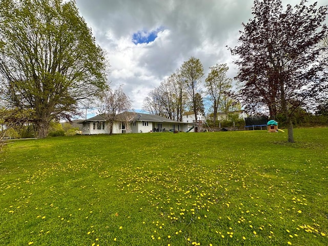 62 Canoe Camp Creek Rd, Mansfield, PA 16933 - view of yard featuring a trampoline