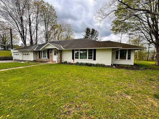 62 Canoe Camp Creek Rd, Mansfield, PA 16933 - single story home with brick siding, a garage, driveway, and a front yard