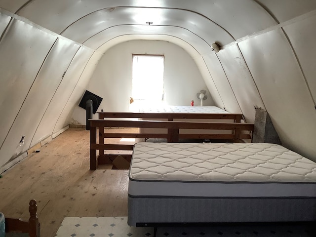 bedroom featuring lofted ceiling