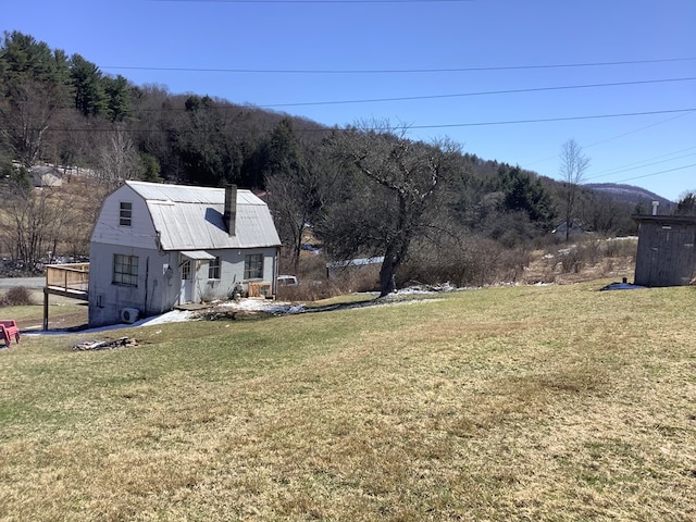153 Zoerb Hollow Rd, Galeton, PA 16922 - view of green lawn featuring a wooded view