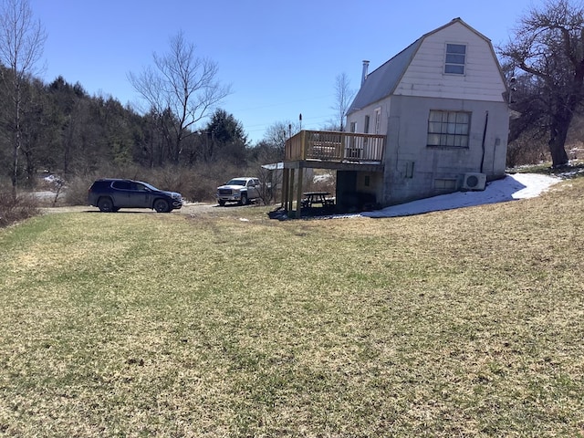 view of yard with a wooden deck