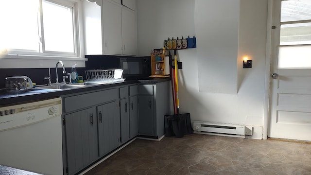 kitchen featuring gray cabinetry, sink, a baseboard radiator, and dishwasher