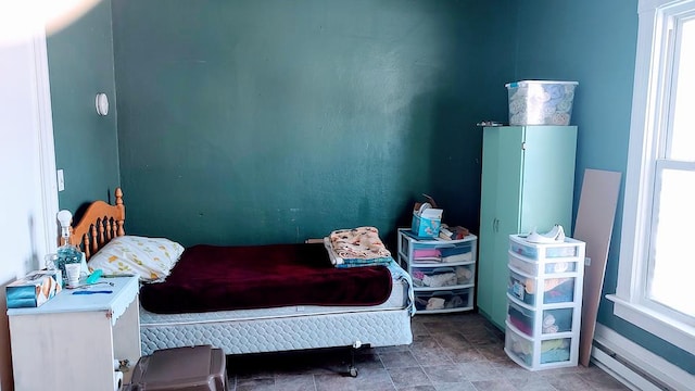 bedroom featuring a baseboard radiator