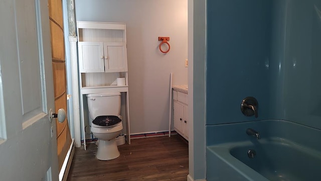 full bathroom with vanity, wood-type flooring, shower / bathtub combination, and toilet