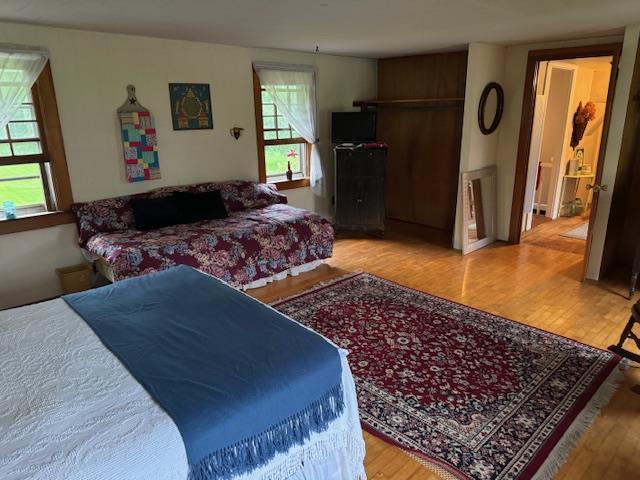 bedroom featuring light hardwood / wood-style flooring